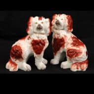 Pair of Red and White Dogs