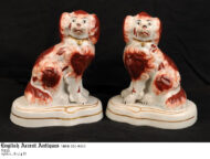 Pair of Red and White Dogs on Bases