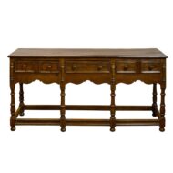 English 1860s Oak Dresser Base with Drawers, Scalloped Apron and Turned Legs