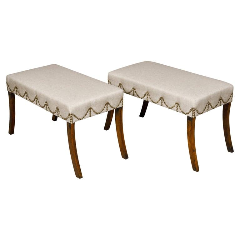 Pair of English Regency Mahogany Stools with Saber Legs and Custom Upholstery