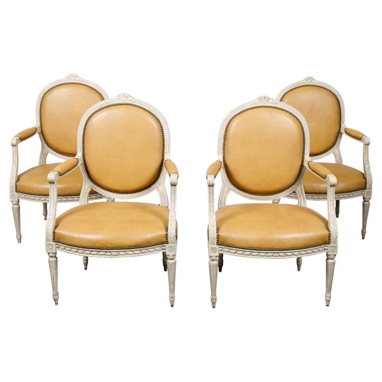 Set of Four French Louis XVI Style 1900s Oval Back Painted and Carved Armchairs
